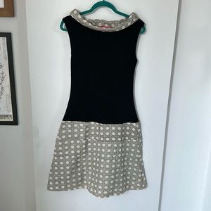 Made in Spain, Boutique mini dress in black with cream patterned skirt.